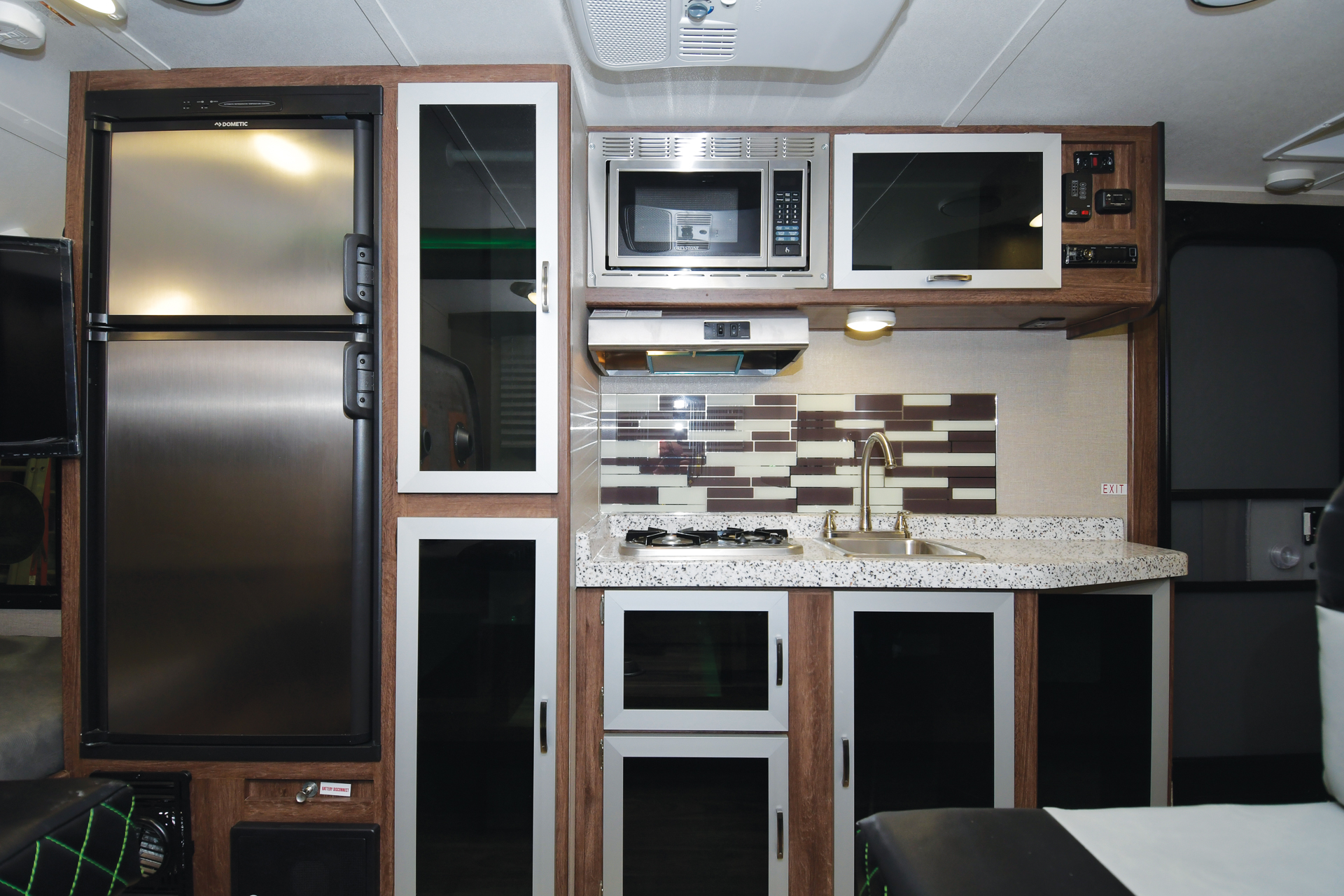 The modern galley in the Falcon GT is fully equipped with aluminum and tempered glass doors and a lightweight but durable countertop.