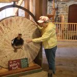 Delta Anna Greenhorn inspects Buhr Mill stone 8528