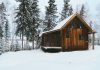 A snowy cabin in Manitoba along a lake in Whiteshell Provincial Park