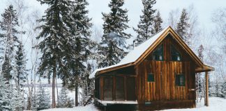 A snowy cabin in Manitoba along a lake in Whiteshell Provincial Park