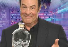 Photo of Dan Akroyd holding a bottle of Crystal Head Vidka at the Mariott Rousseau Icebar