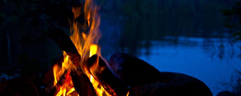 Roasting marshmallows at a campsite in Steuben County