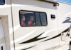 RVing with kids - the window seat is always the preferred spot for kids in RVs.