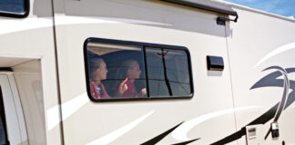 RVing with kids - the window seat is always the preferred spot for kids in RVs.