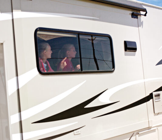 RVing with kids - the window seat is always the preferred spot for kids in RVs.