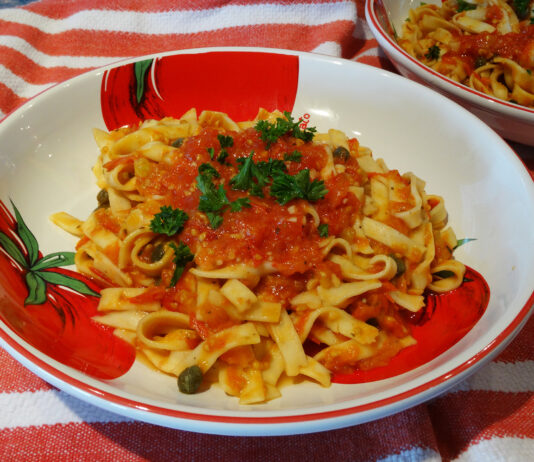 Fettucini with fresh tomato caper sauce
