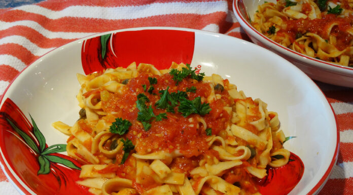 Fettucini with fresh tomato caper sauce