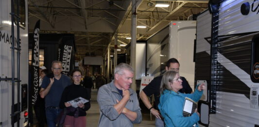 Visitors to the Toronto Fall RV Show and Sale examine the latest in RV design and technology.