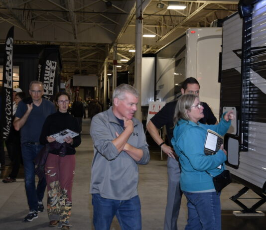 Visitors to the Toronto Fall RV Show and Sale examine the latest in RV design and technology.