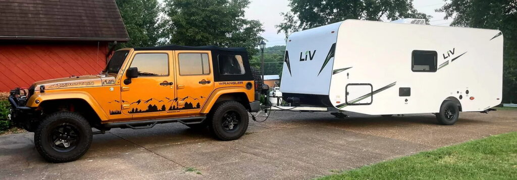Go RVing off-road with a LIV RV trailer and a Jeep Wrangler.