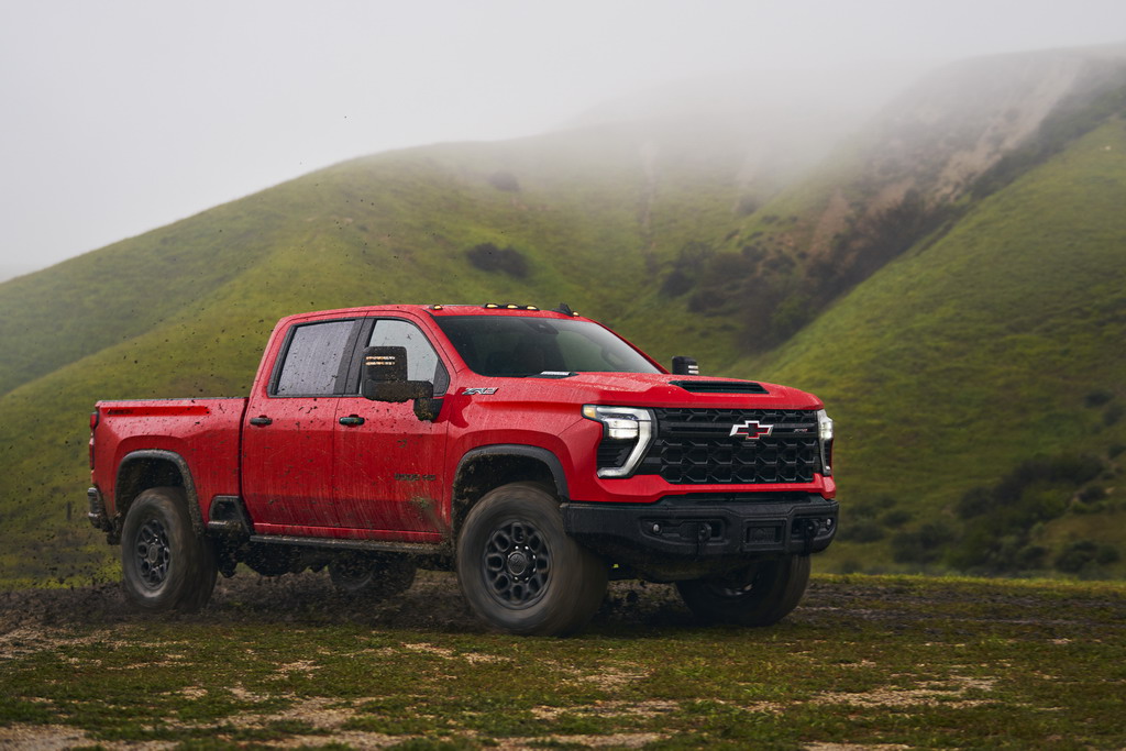 The Silverado HD ZR2 Bison stationary on a muddy trail.