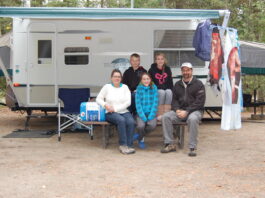 The Coles family with their first travel trailer. Photo by Cheryl Coles.