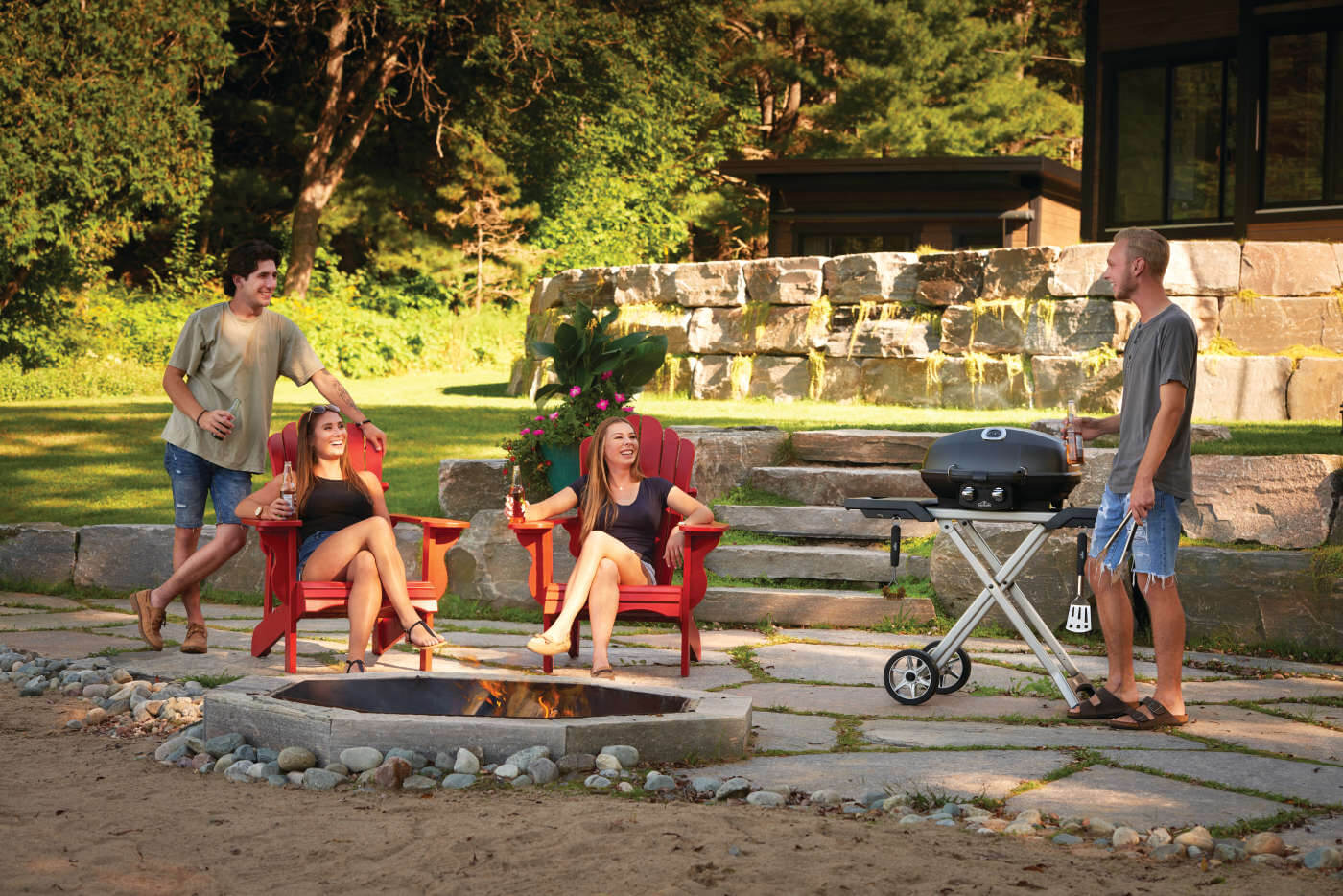 NAPOLEON 4 PRO285X-BK-Web-Gallery-10-PRO285X-BK-Life-Cottage-Beach-Lifestyle-PplOpt2_b77c85da The Napoleon TravelQ PRO with Scissor Cart allows you to bring professional grilling anywhere with a convenient portable package.