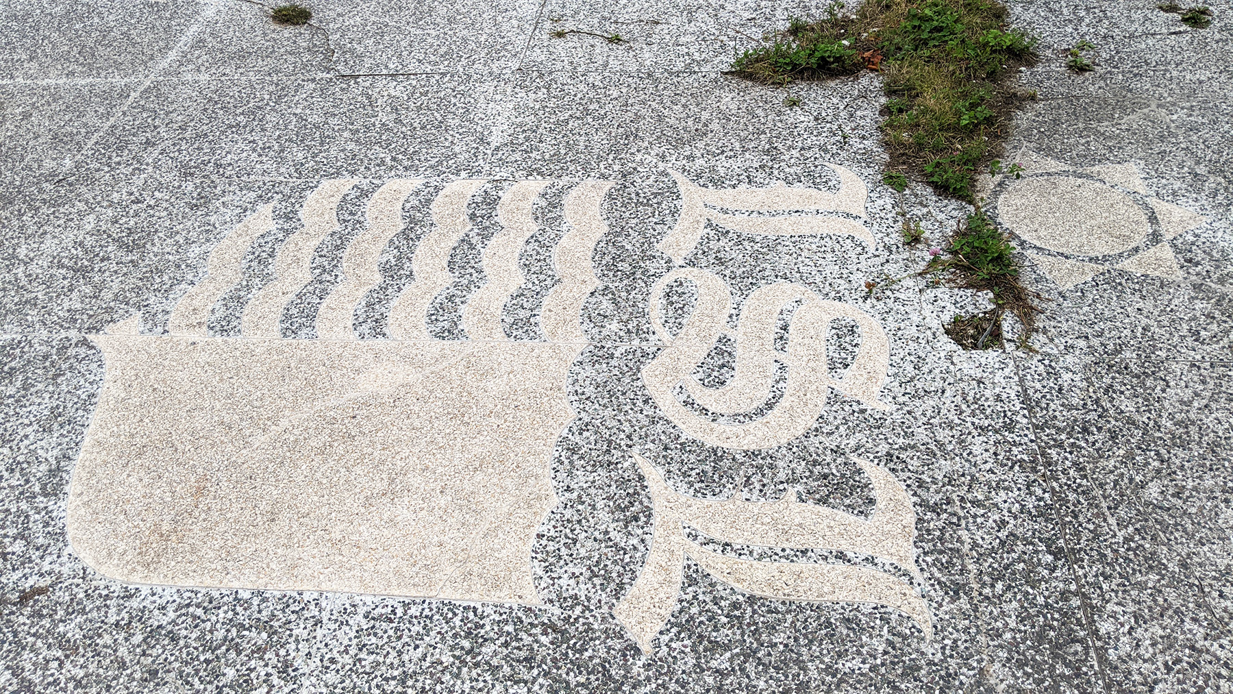 Lakeshore Lodge logo on old dance floor