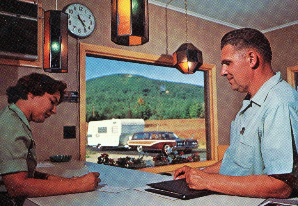 Victor King greets a camper in this 1966 archive photo from Lake George RV Park.
